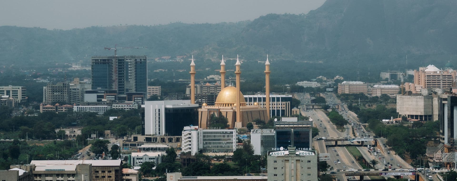 The Abuja skyline, looking towards the National Mosque and Aso Rock